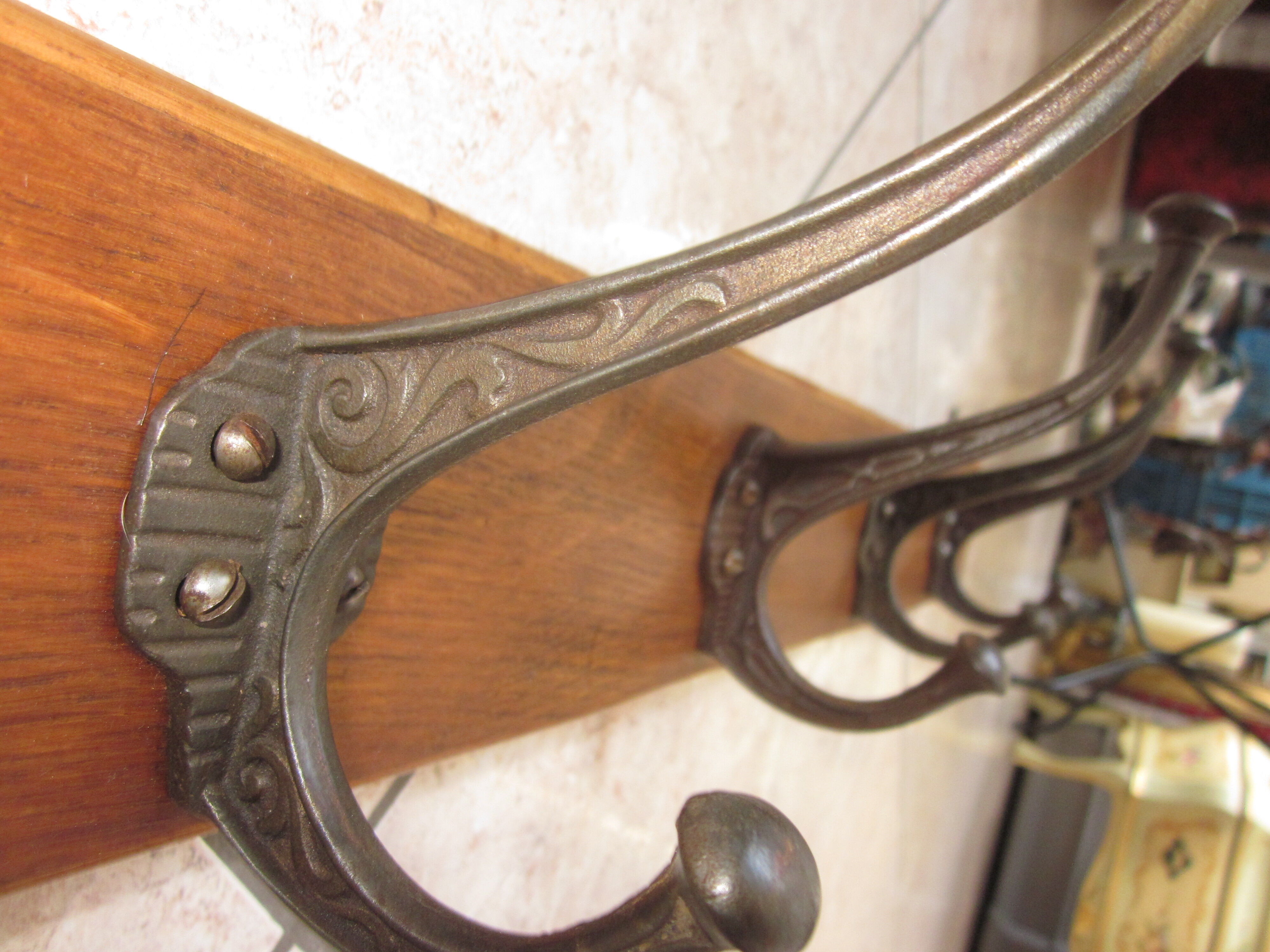 Bistro coat rack has 6 cast iron pads