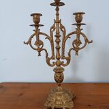 Bronze candlestick with lion head decoration
