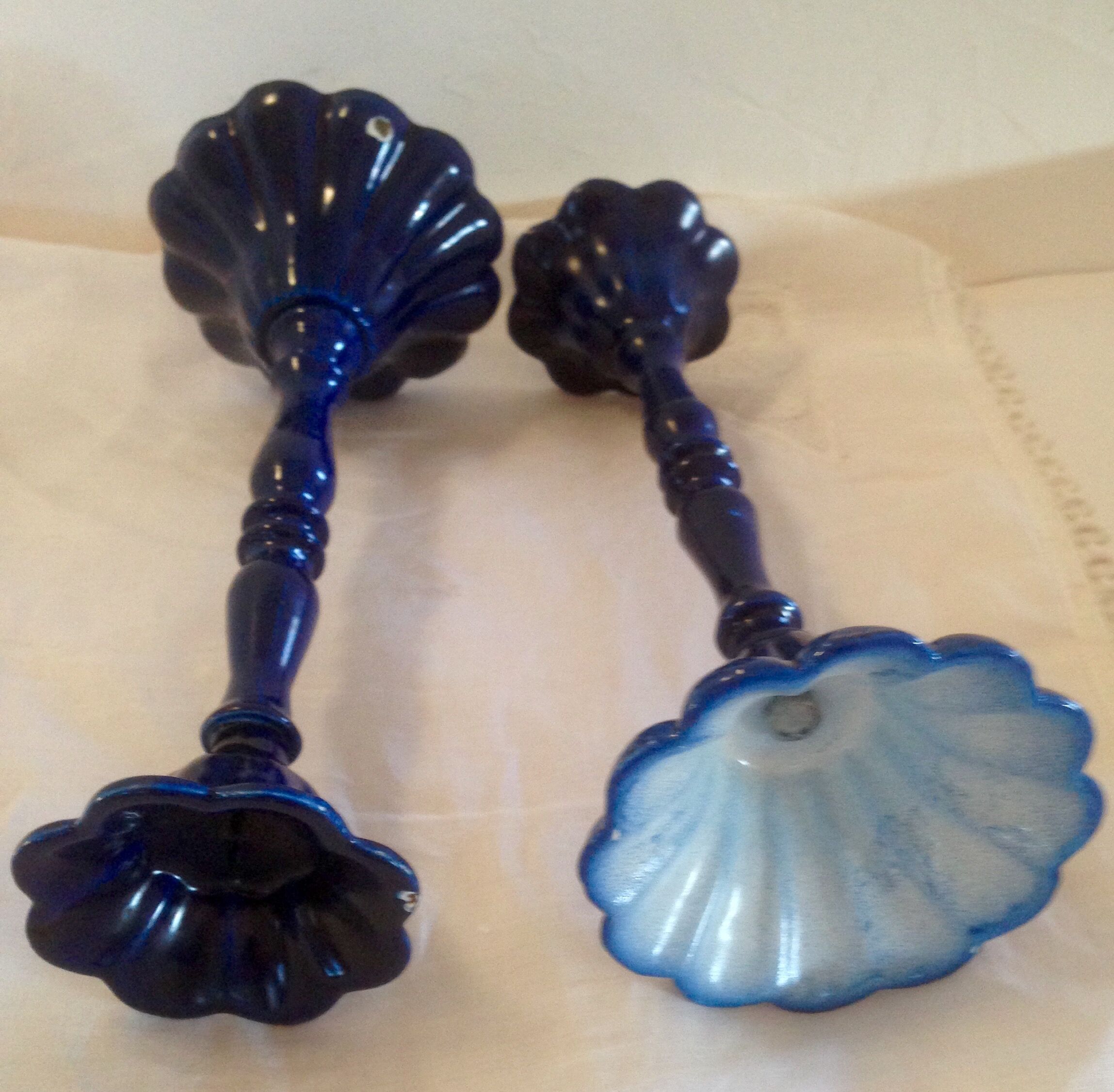 Vintage enameled cast-iron candleholders