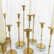Set of 15 Scandinavian candle holders in brass and glass, Gunnar Ander, Ystad Met