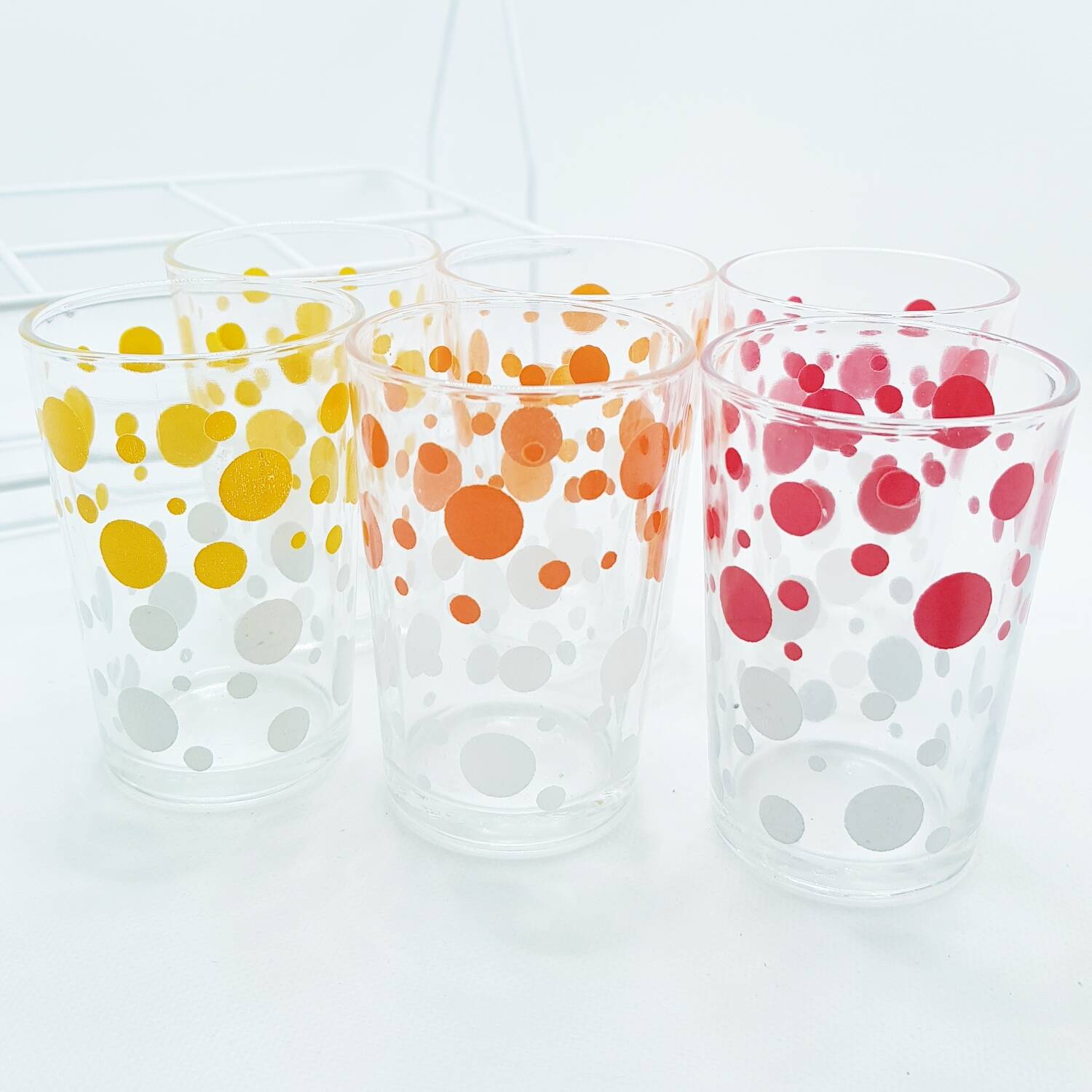 6 polka dot juice glasses in carrier