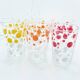 6 polka dot juice glasses in carrier