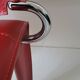 Red leather chairs by Arper