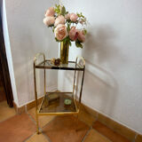 Gold metal and smoked glass console table.