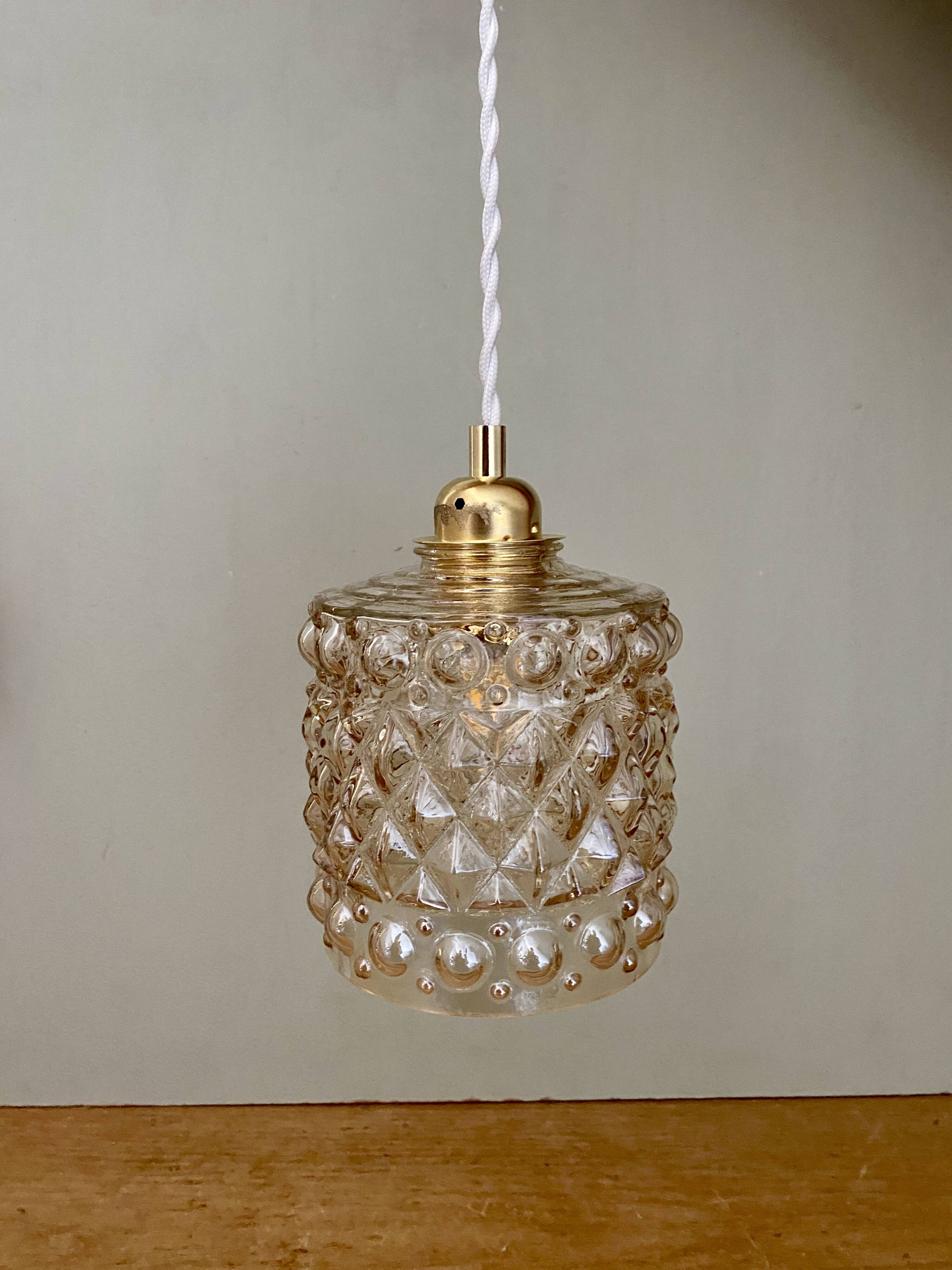 Vintage amber glass globe pendant light