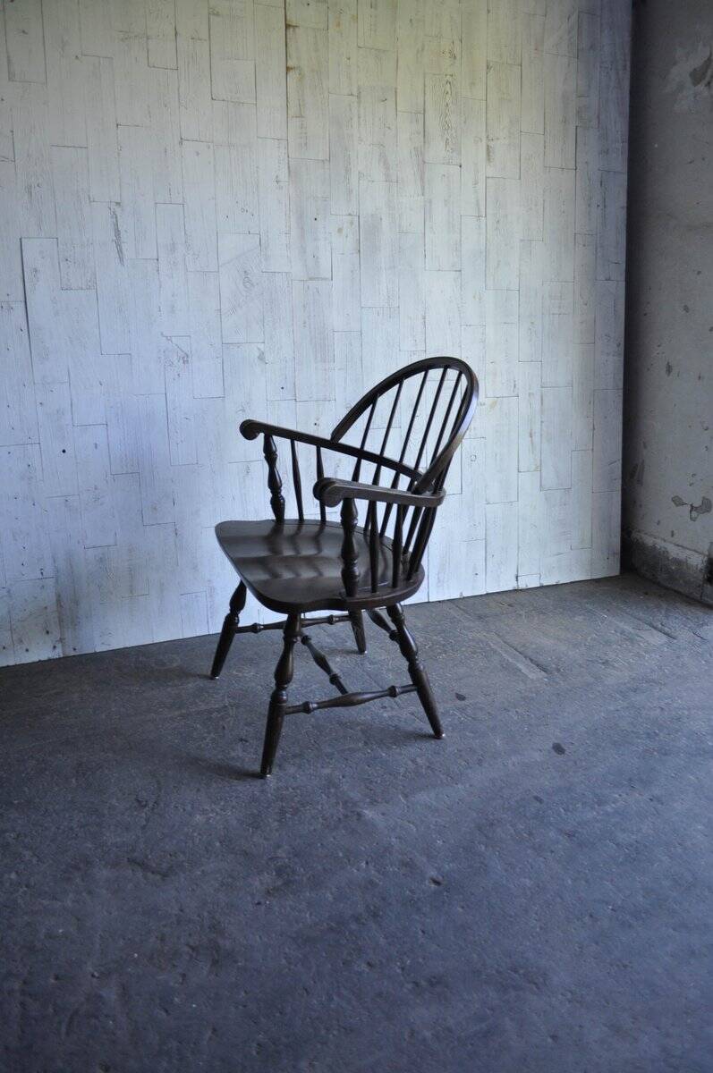 Brown wooden Windsor chair, 19th century — slatted backrest and carved seat