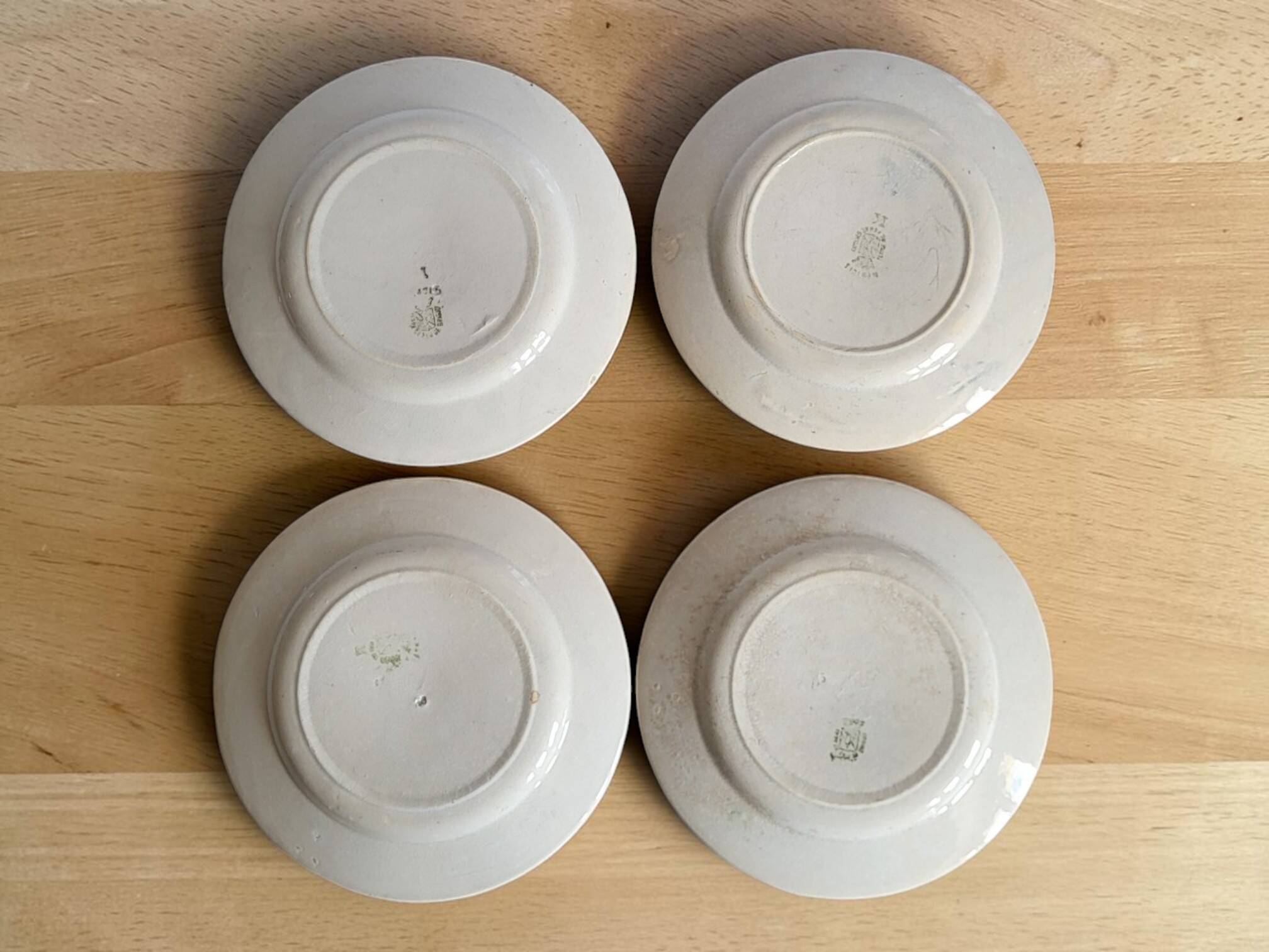 4 earthenware plates, Grigny — "Muguet" model