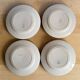 4 earthenware plates, Grigny — "Muguet" model