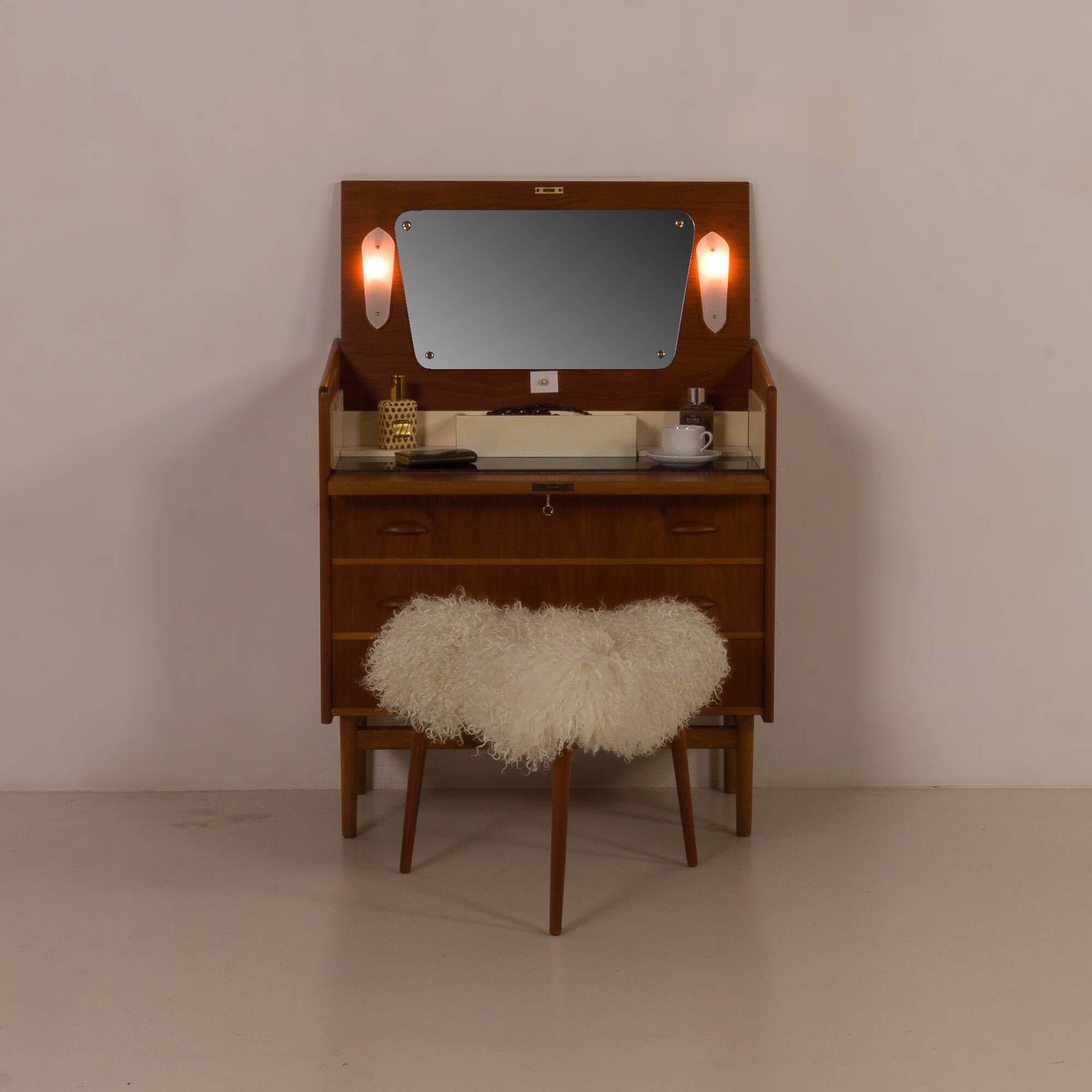 Danish teak dresser with hidden vanity and lights, 1960s