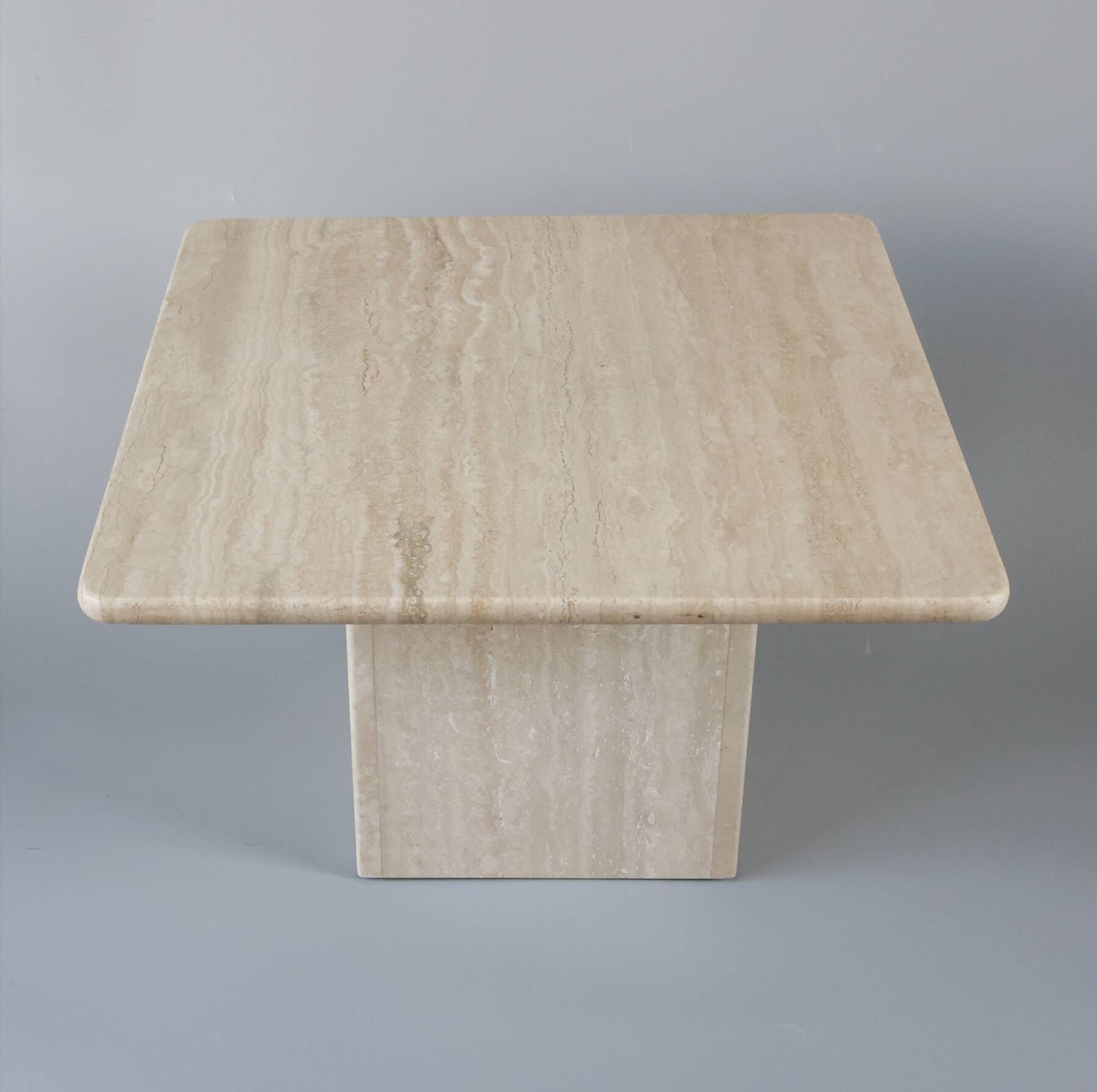 Travertine side table