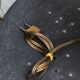 Table lamp in gilded metal, bakelite and antique plexiglass