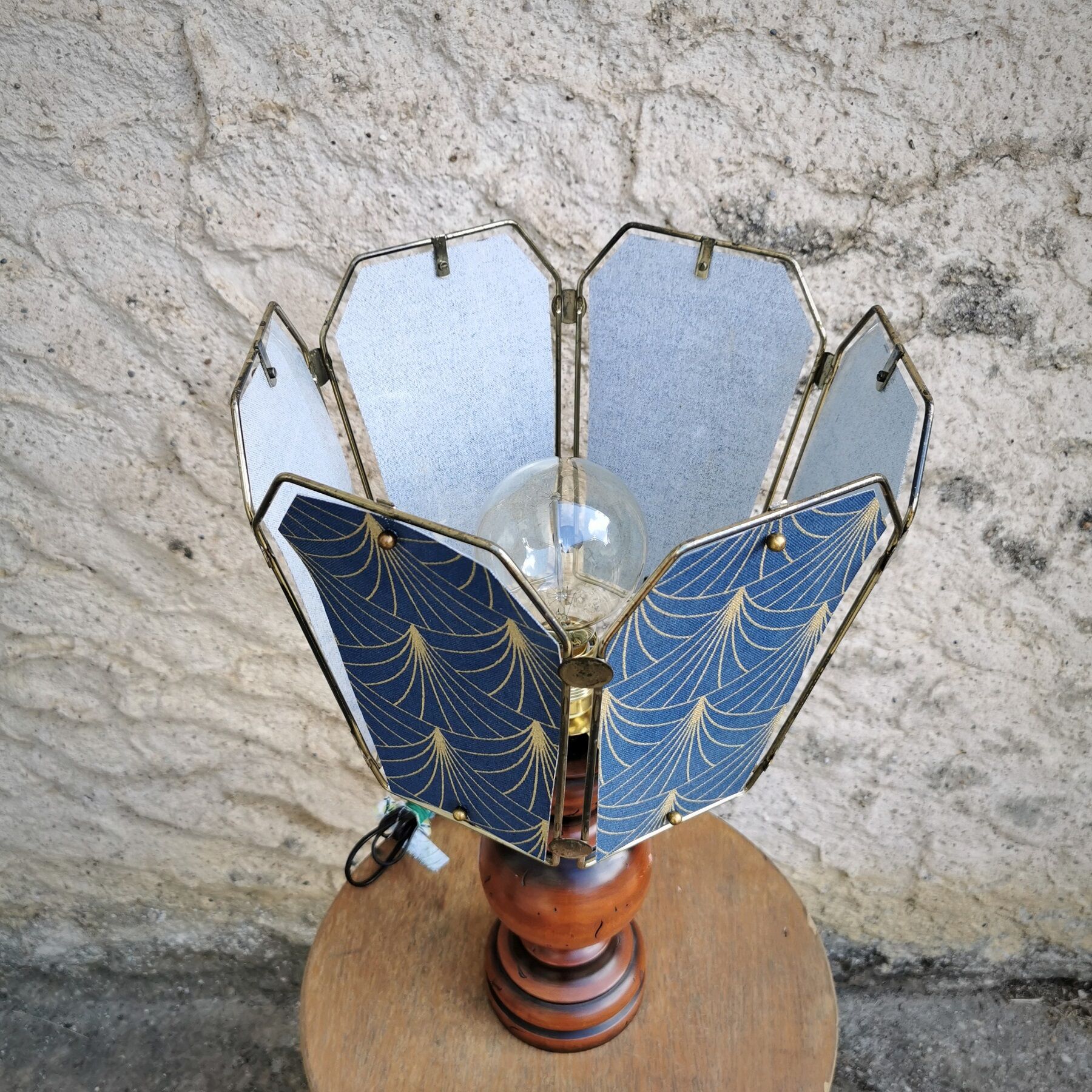 Table lamp, old turned wooden foot, metal lampshade and art deco print