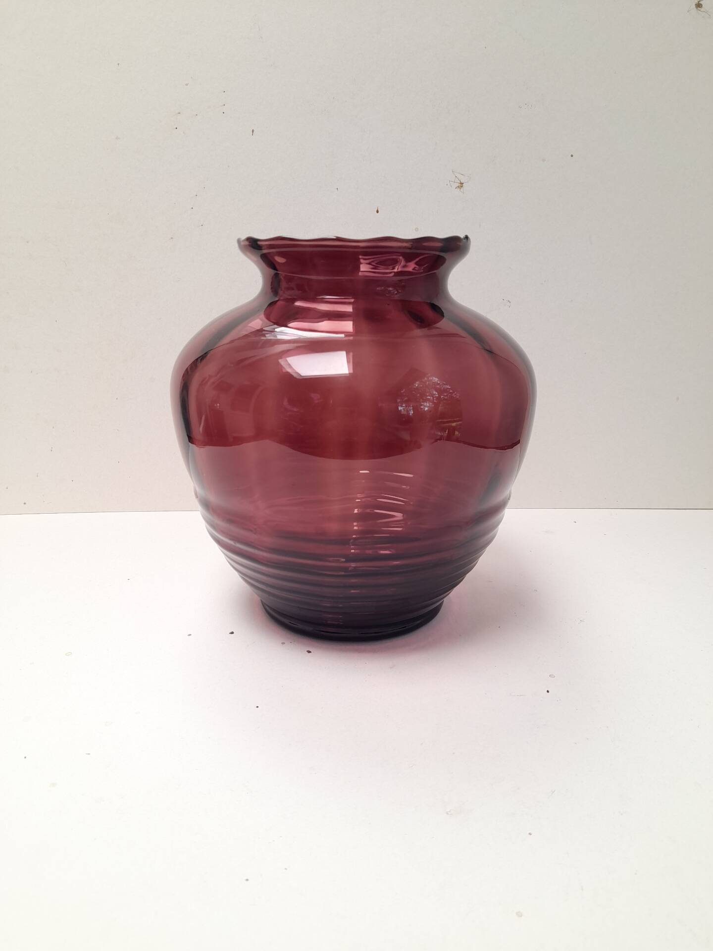 Beautiful Doyen Art Deco vase in burgundy glass.