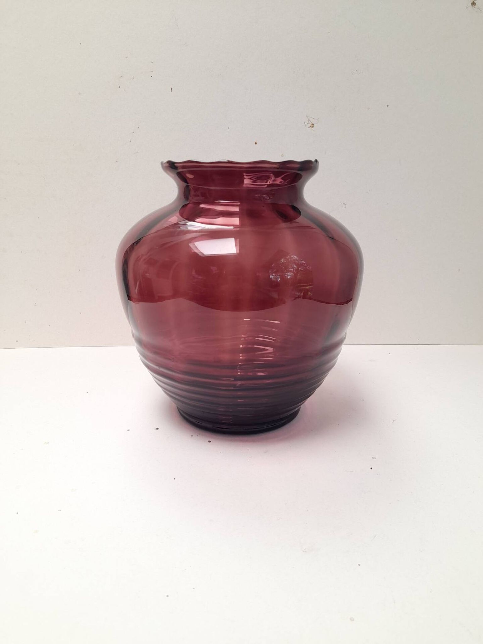 Beautiful Doyen Art Deco vase in burgundy glass.