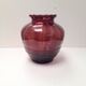 Beautiful Doyen Art Deco vase in burgundy glass.