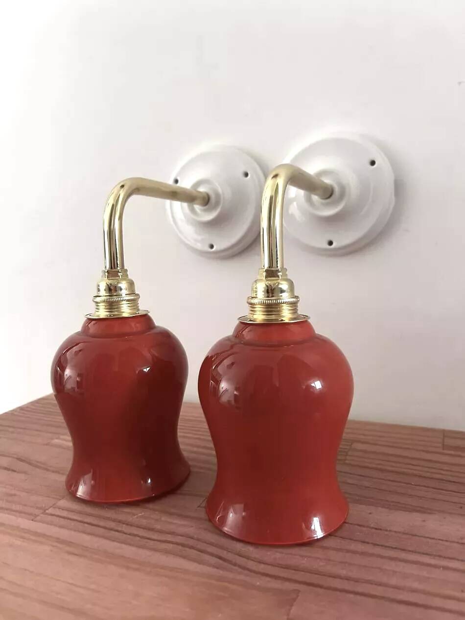 Pair of ceramic and glass wall sconces