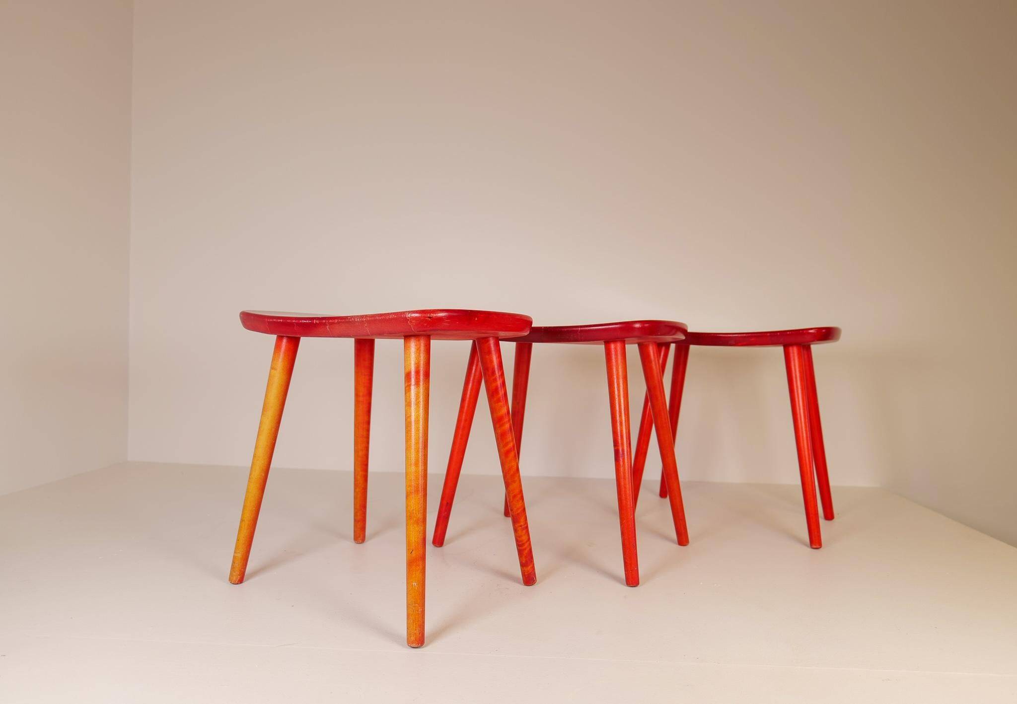 Swedish stools in red lacquered birch, Yngve Ekström "Palle", 1970s