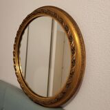 Large round mirror in Spanish gilded carved wood