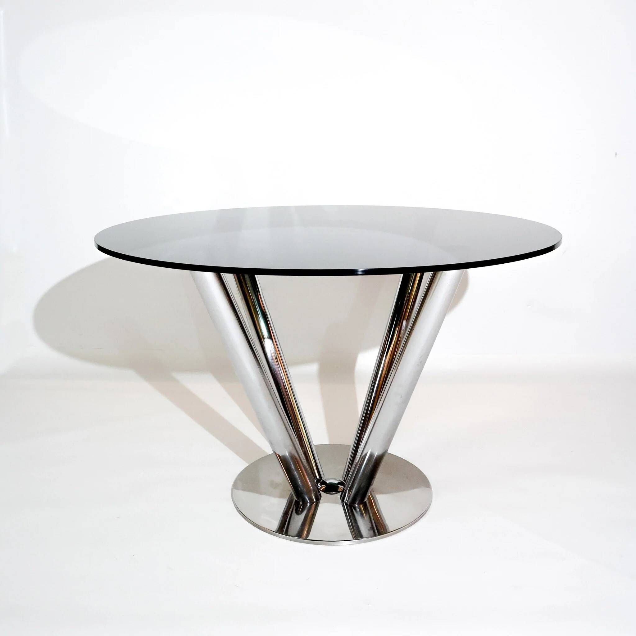 Vintage round dining table by Carlo Bartoli, smoked glass and polished chrome, Italy, 1970s.