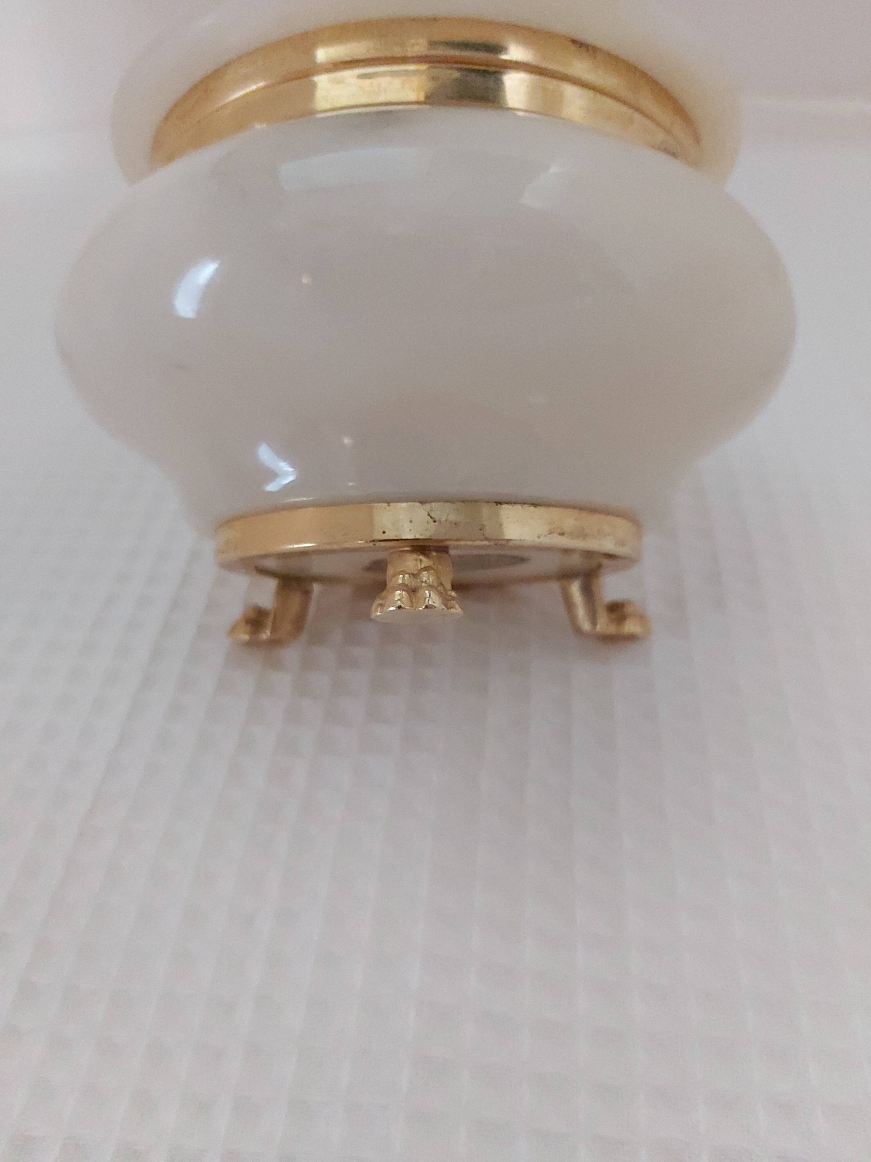 Ivory-colored alabaster box on feet