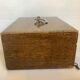 Old wooden box with handle and metal keys