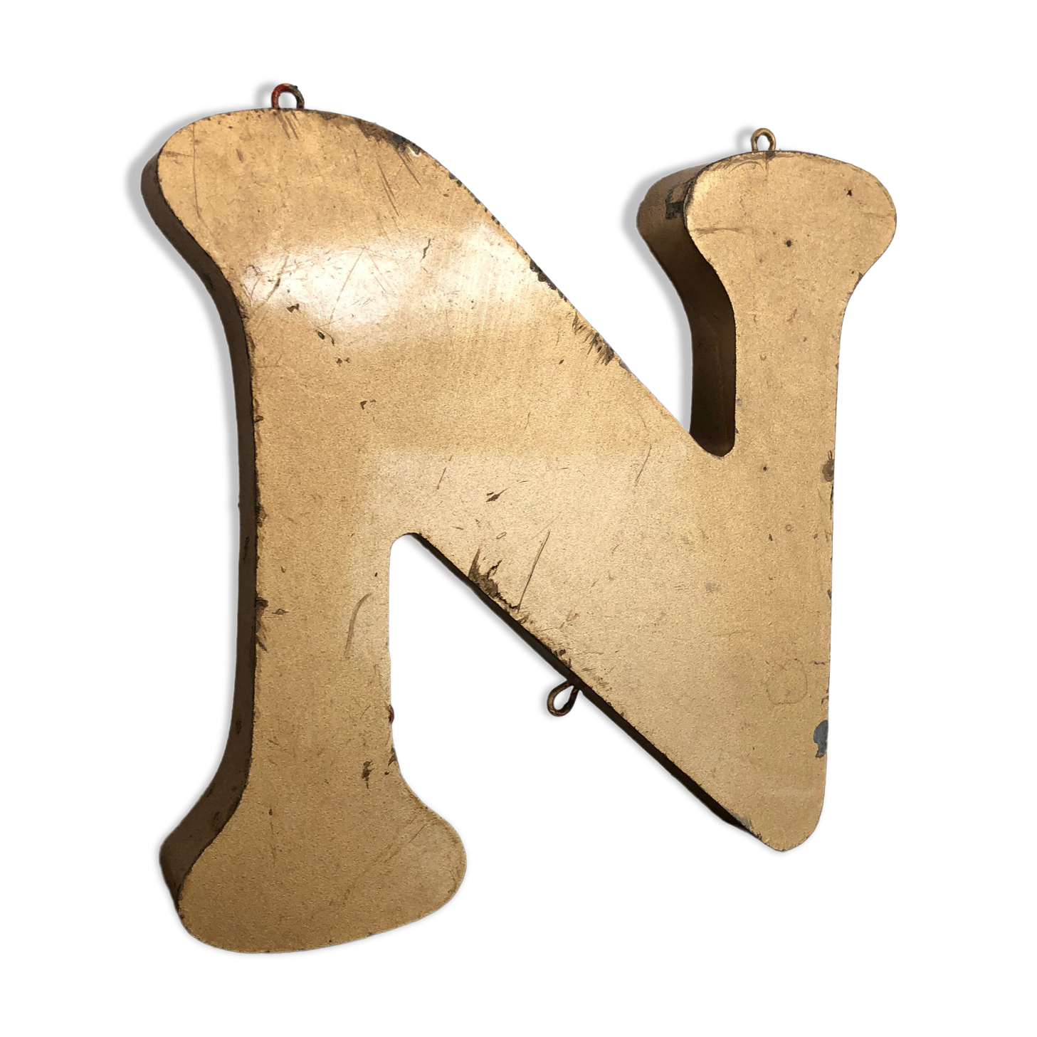 Golden sign letter "N"