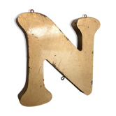 Golden sign letter "N"