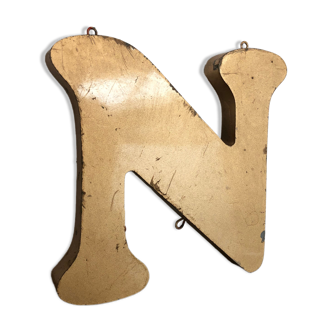 Golden sign letter "N"