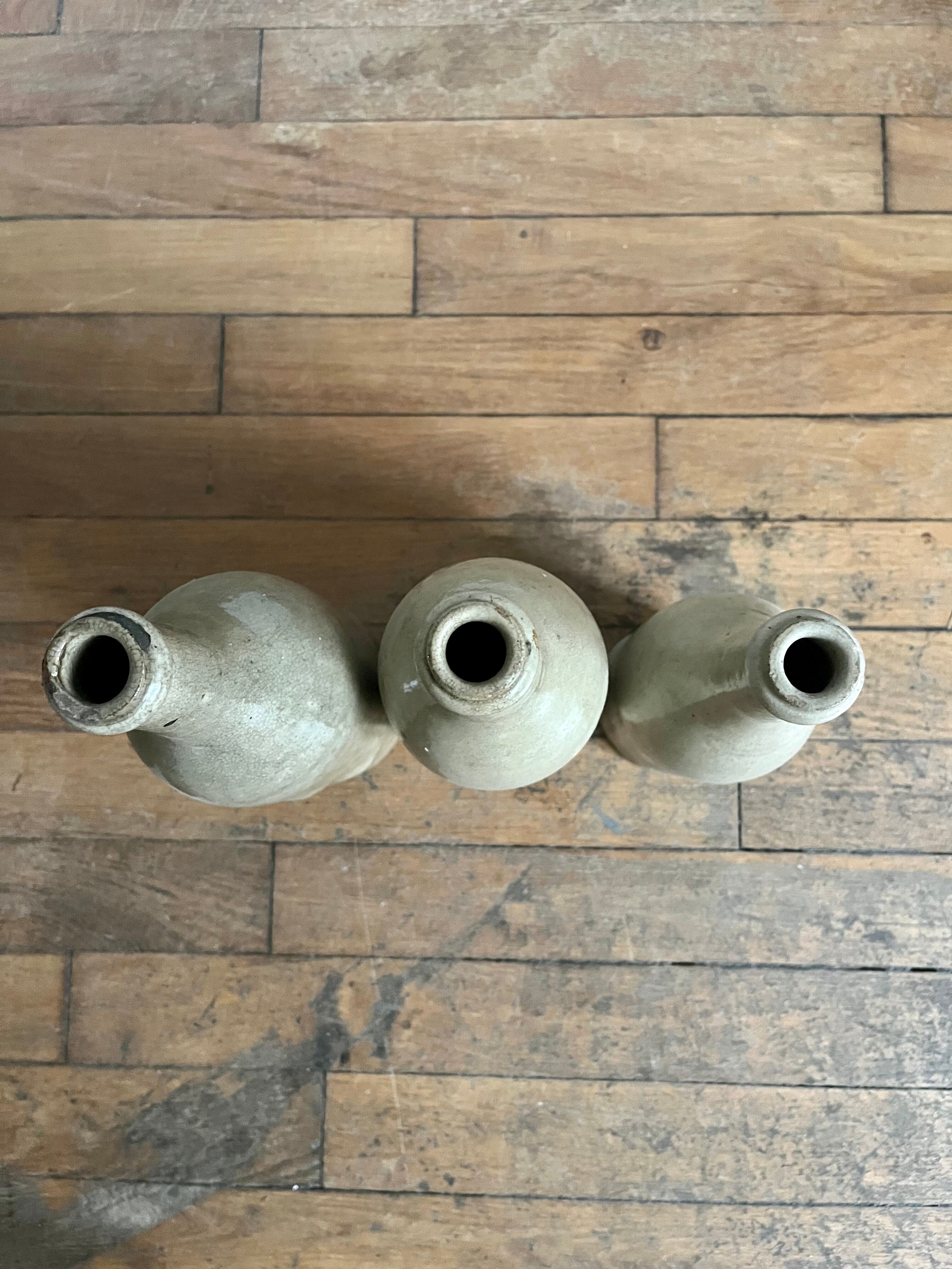 3 antique stoneware bottles