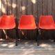 5 orange plastic chairs by Robin Day for Hille