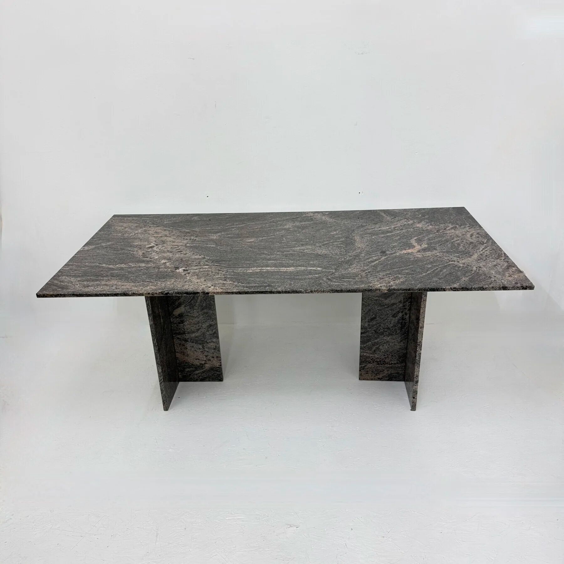 Mid-century design granite dining table, 1970shttps://nuvintage.nl/product/
