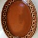 Oval plate in varnished sandstone 70'