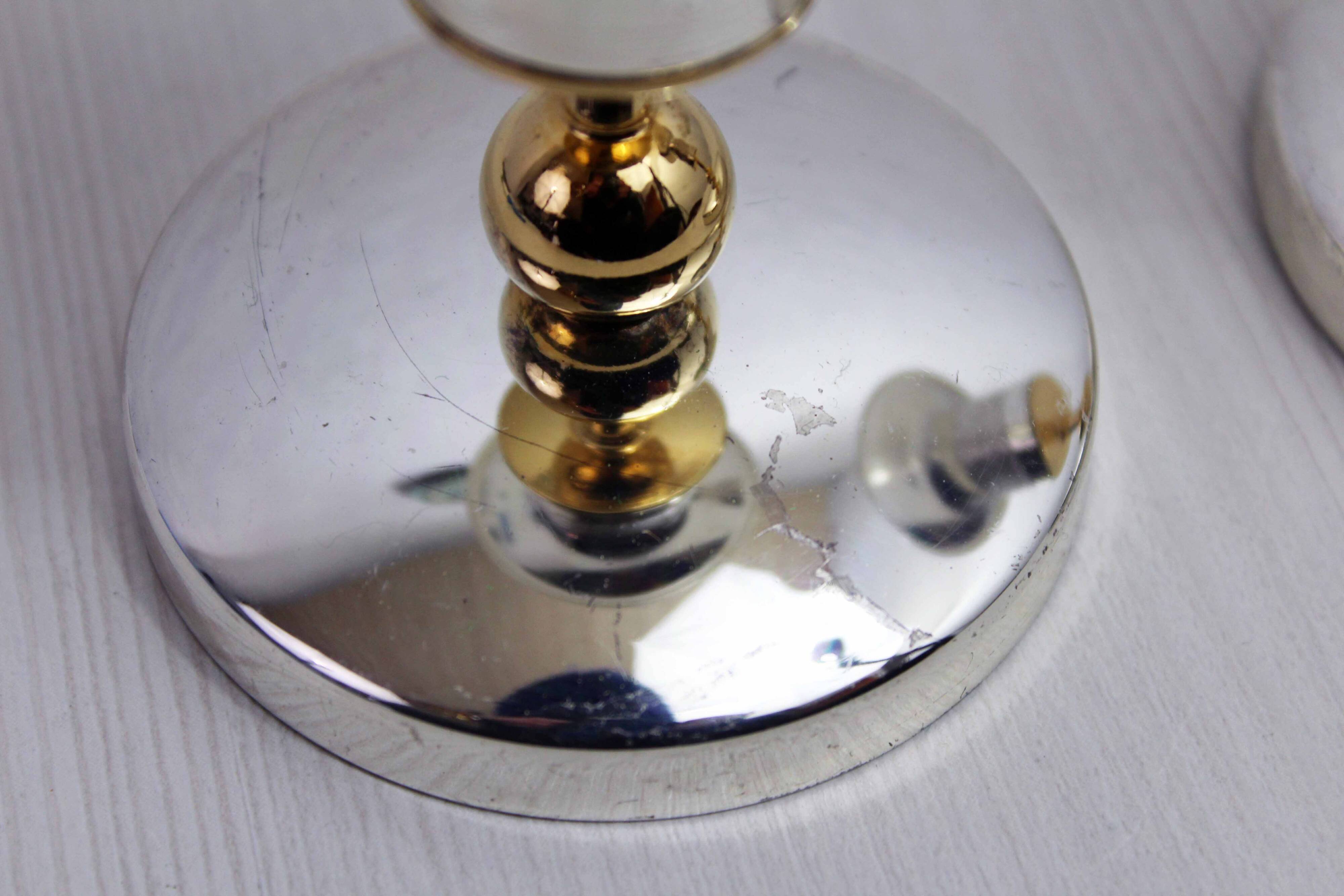 Pair of silver metal candlesticks