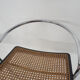 Set of four chrome and cane bar stools, 1970's