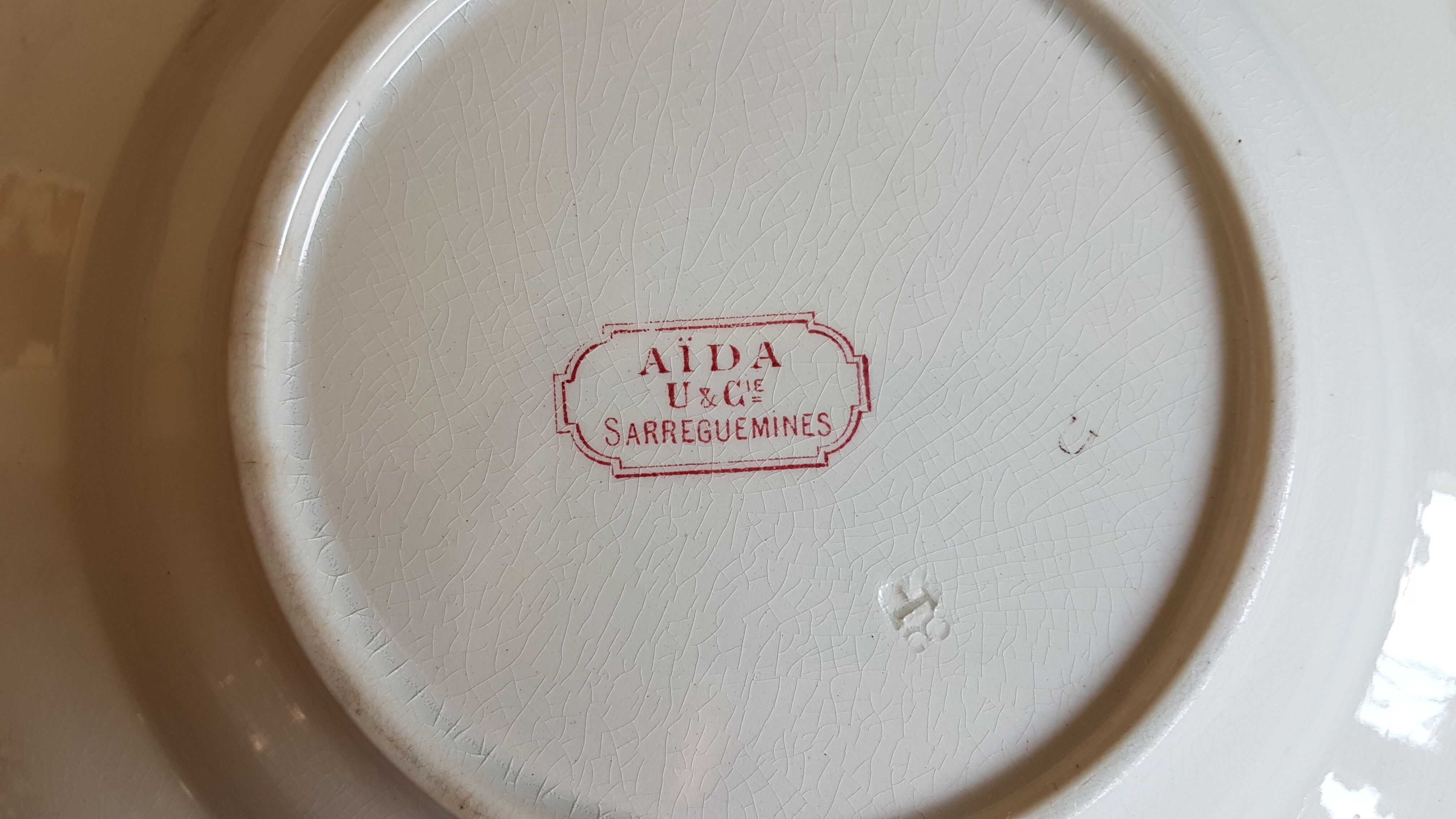 Sarreguemines earthenware plate decorated with flowers