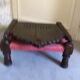 Old Indian armchair carved wood and pink braided rope India antics