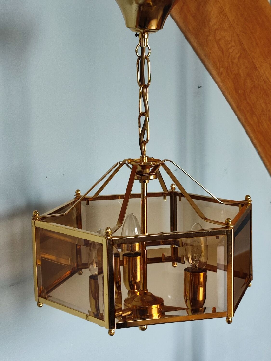 Brass pendant lamp and five-faceted vintage smoked glasses