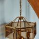 Brass pendant lamp and five-faceted vintage smoked glasses