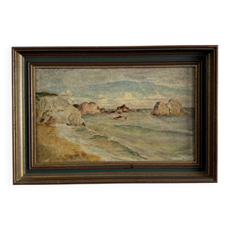 Oil on canvas depicting a rocky coast from the early 20th century