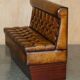 Pair of Victorian Chesterfield pub benches in leather.