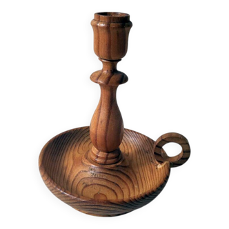 Vintage candlestick holder crafted from turned pine wood Scandinavian-style