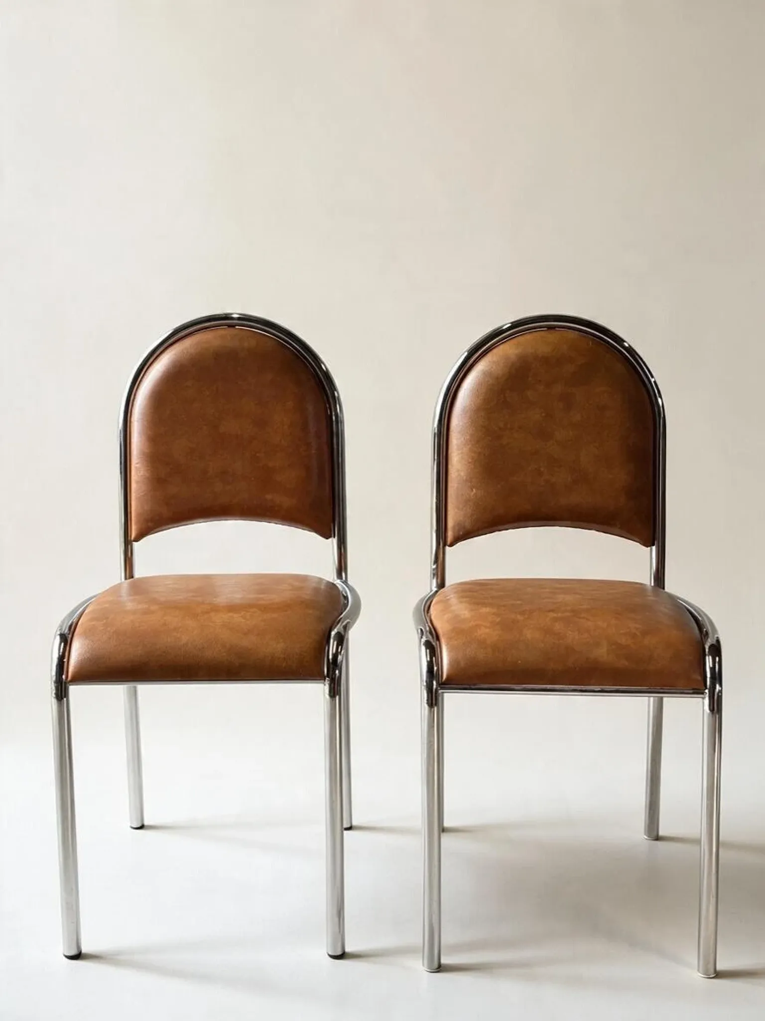 Set of 4 vintage tubular chrome chairs