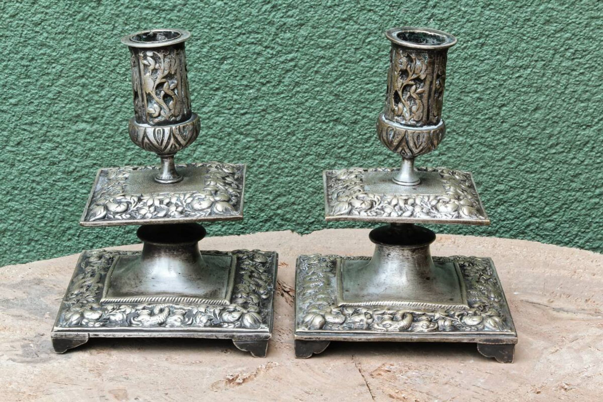 Pair of square candlesticks in patinated bronze
