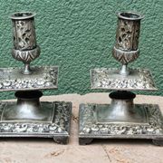 Pair of square candlesticks in patinated bronze
