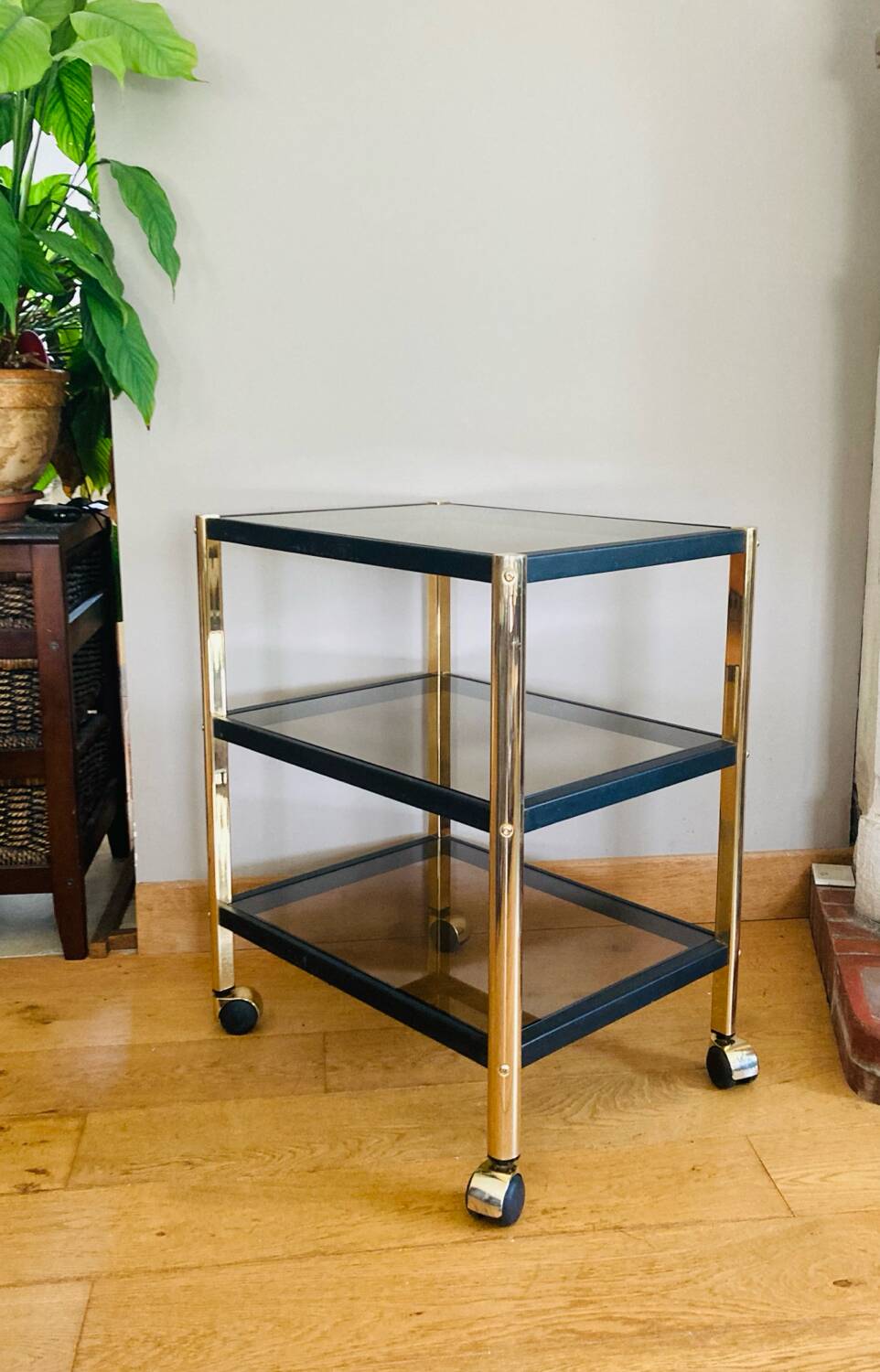 Side table in gold metal and smoked glasses 1970s