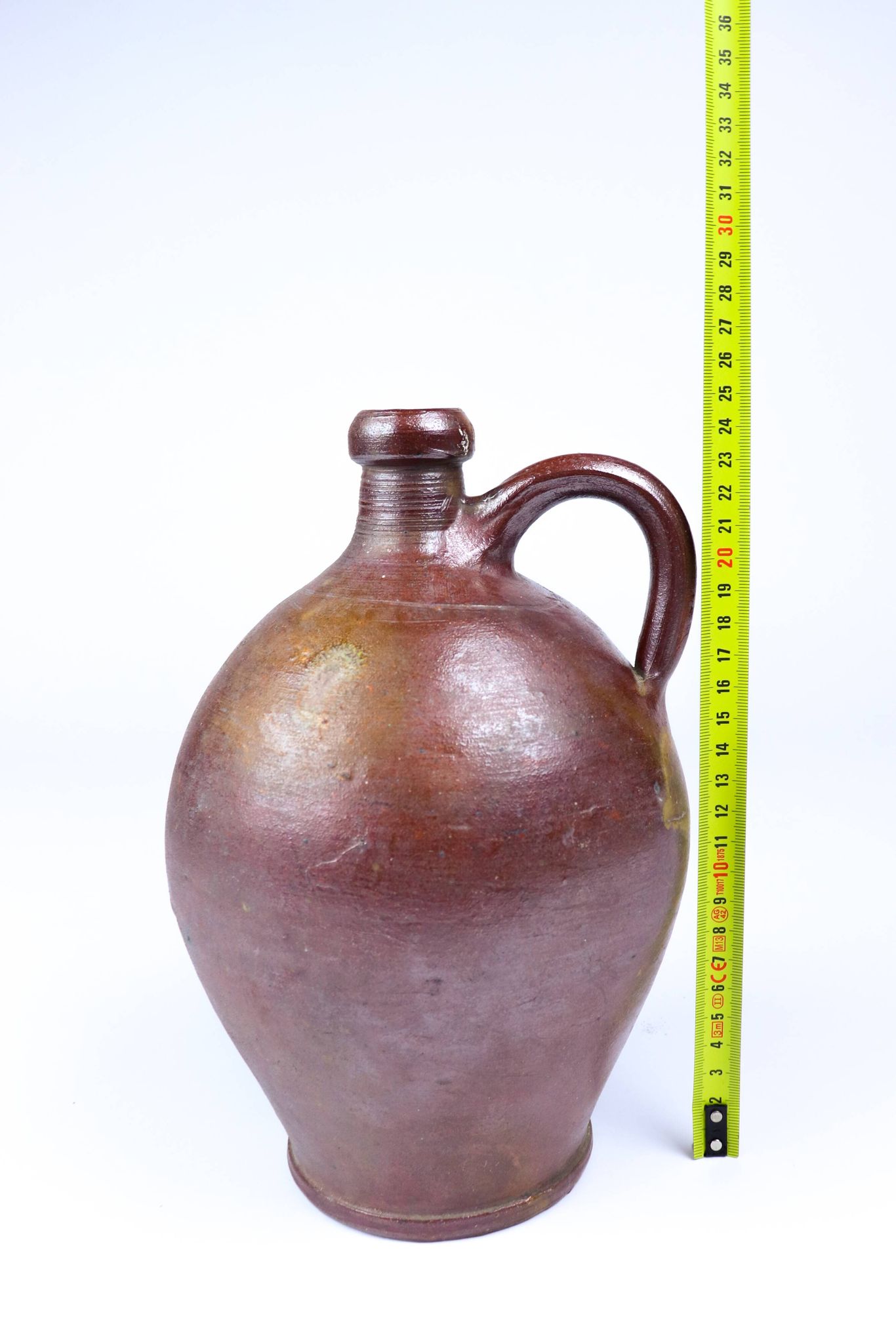 Old enamelled stoneware jug