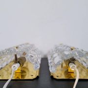 Modern mid-century crystal wall sconces in the shape of a drop by Orrefors by Carl Fagerlund.