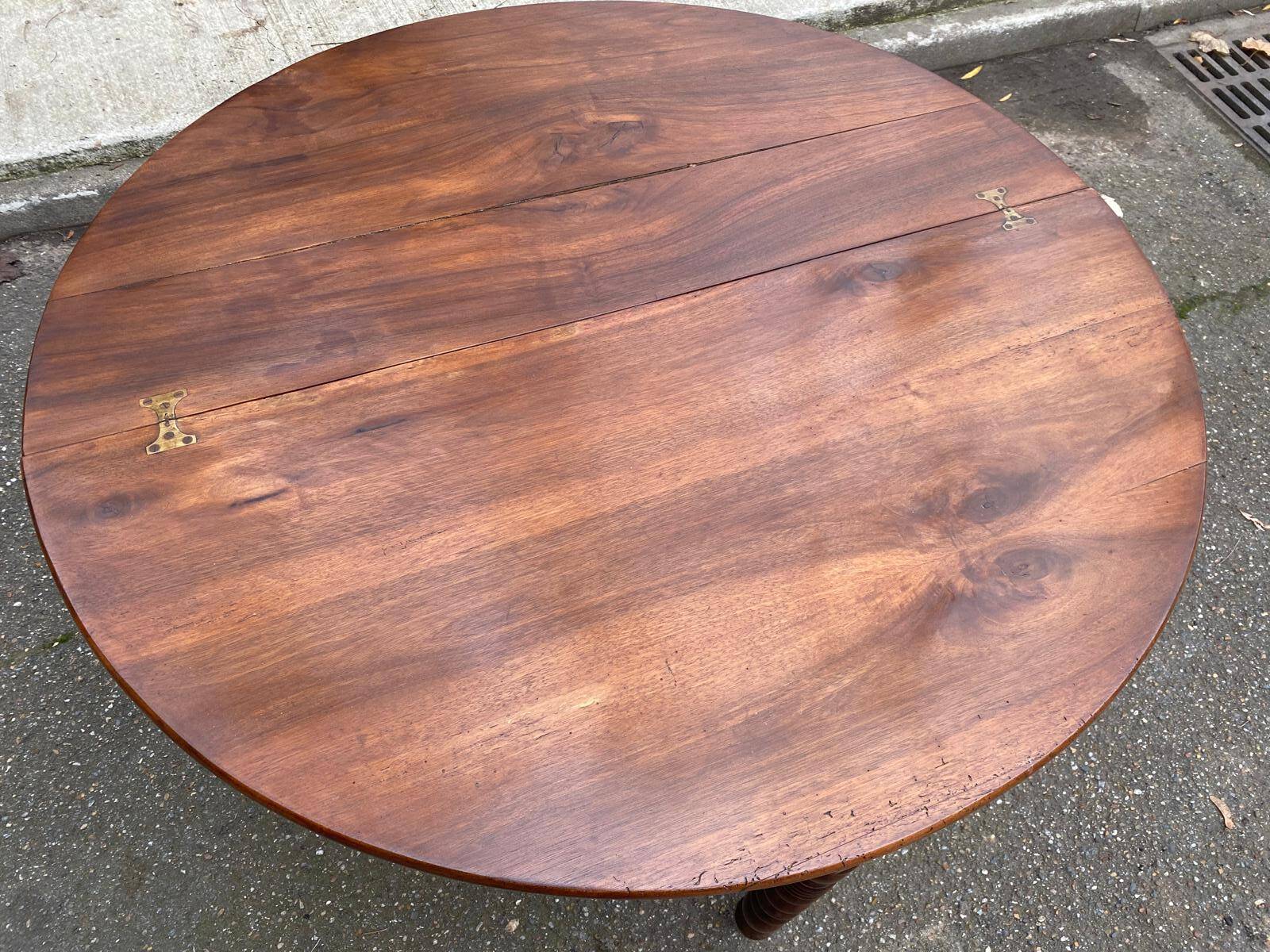 Round extendable dining table with drop leaf, 19th century console table