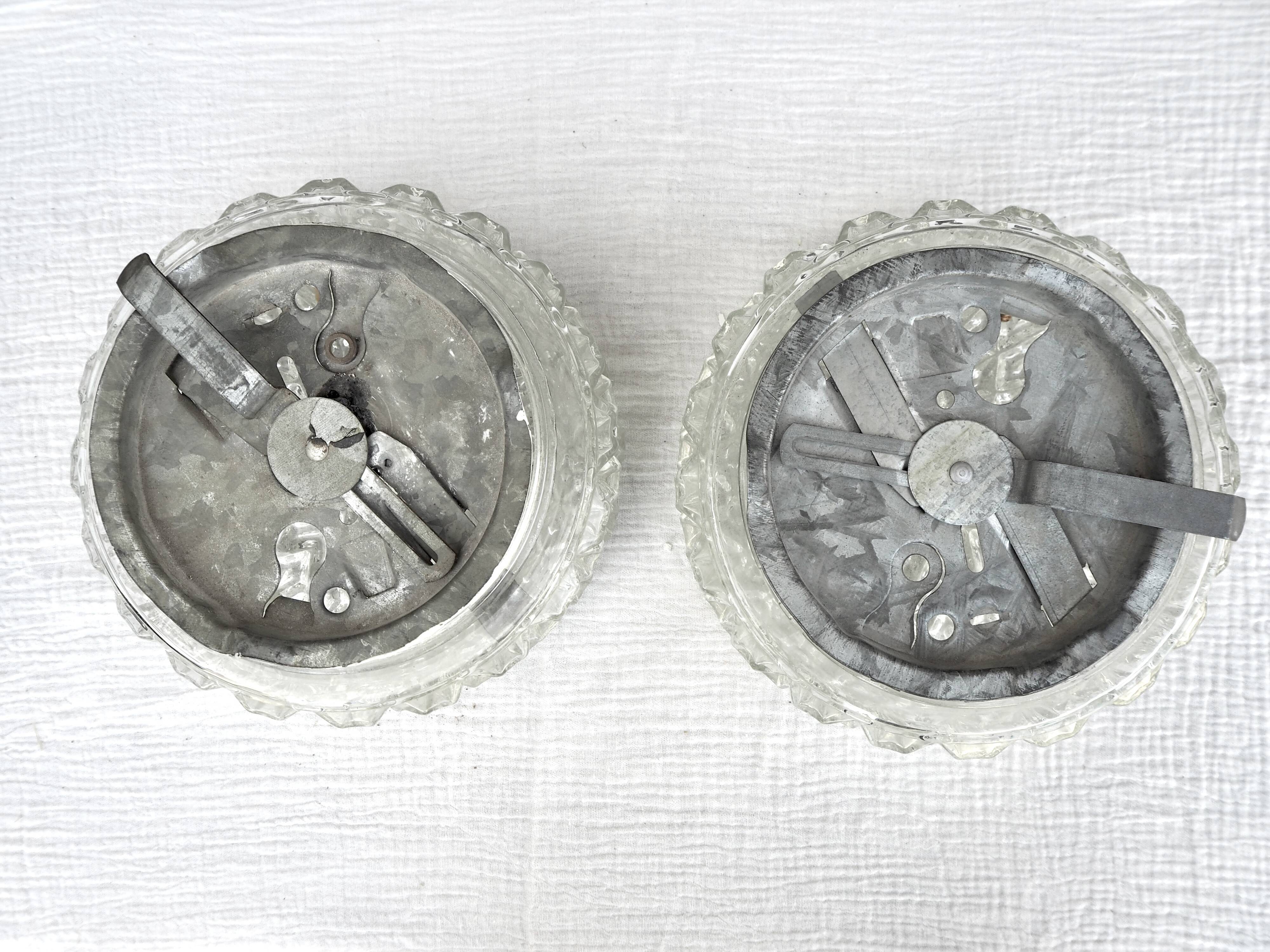 Pair of round ceiling lights in chiseled glass