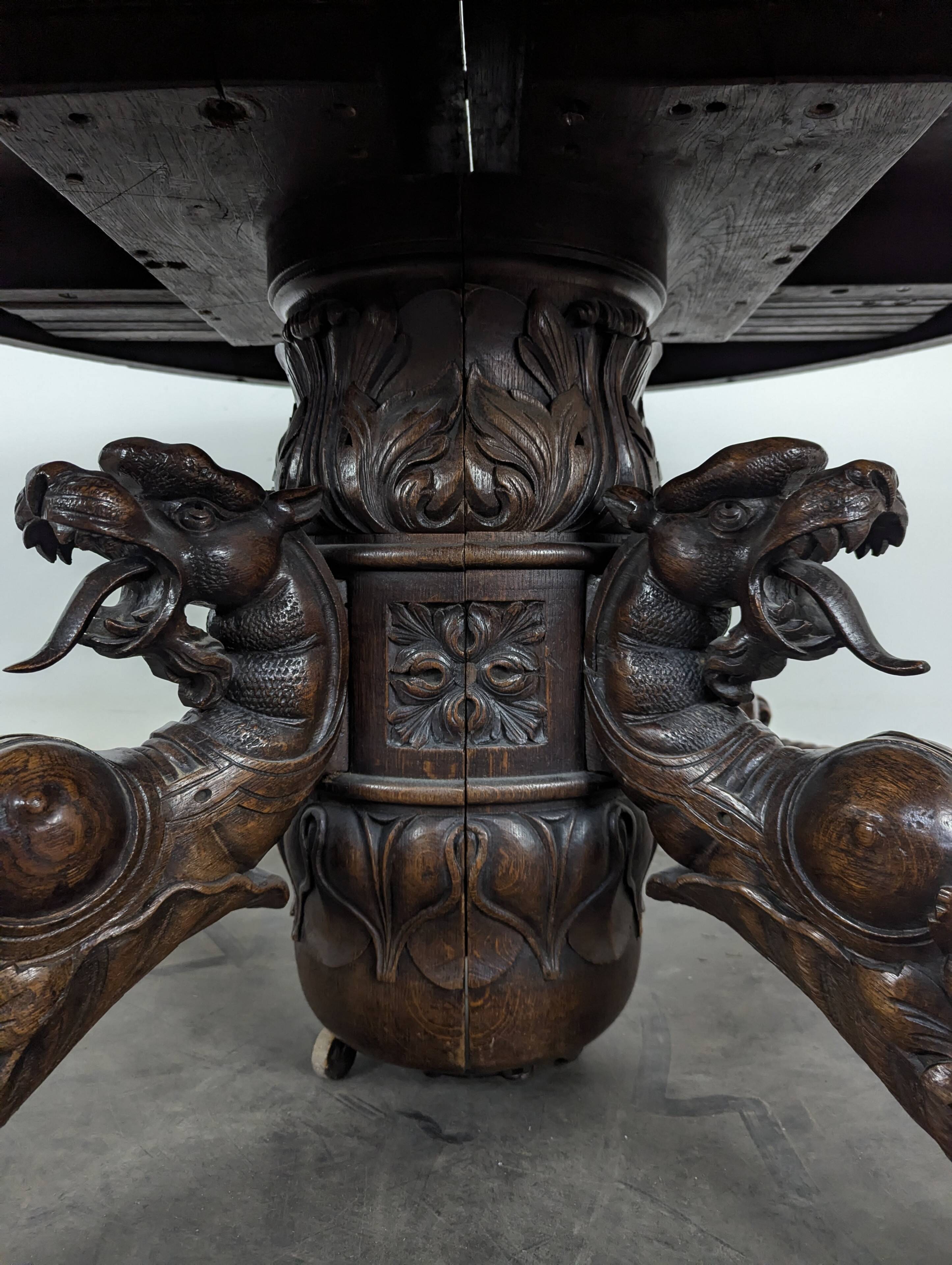 Renaissance-style gueridon with dragon heads in oak
